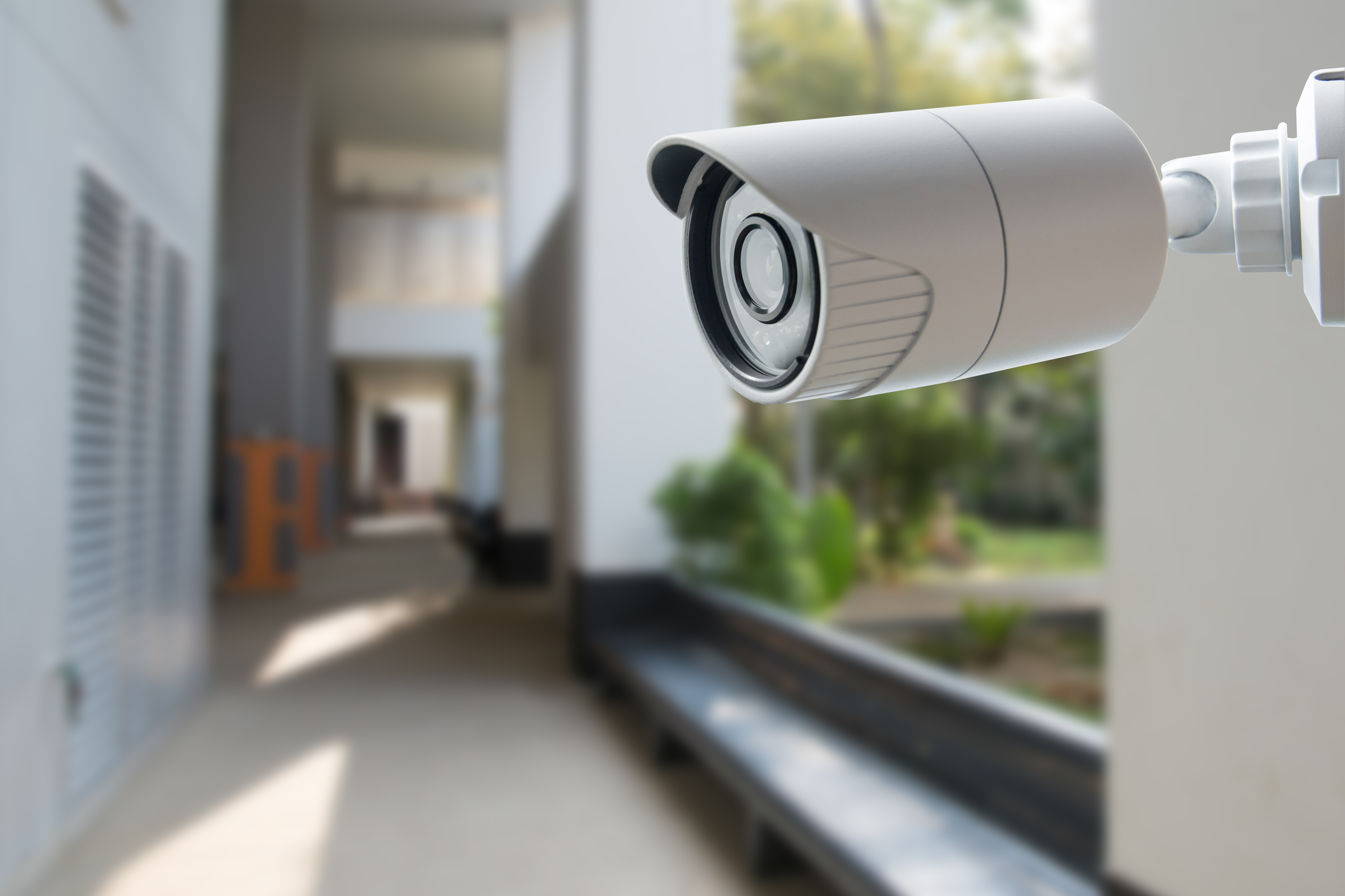 a security camera in a residential hallway 